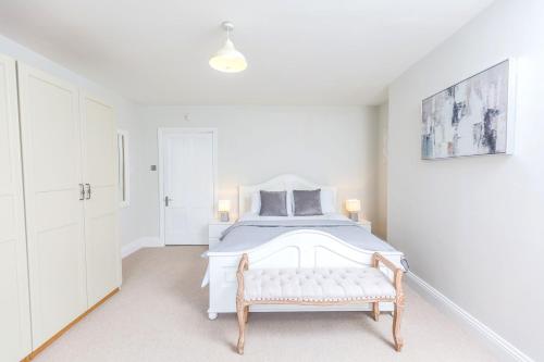 En eller flere senge i et værelse på 32 Evesham Road