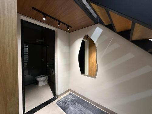 Ένα μπάνιο στο Loft Premium Andradina