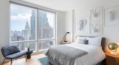 Ένα ή περισσότερα κρεβάτια σε δωμάτιο στο Majestic Residence KLCC By CoxMa