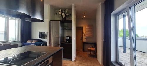 Köök või kööginurk majutusasutuses Atica Penthouse