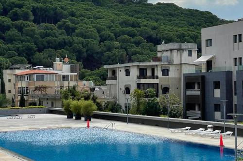 Πισίνα στο ή κοντά στο Fanar Cozy Retreat - 2 Bedrooms