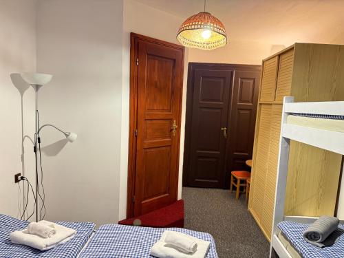 Postel nebo postele na pokoji v ubytování Chata Amálka