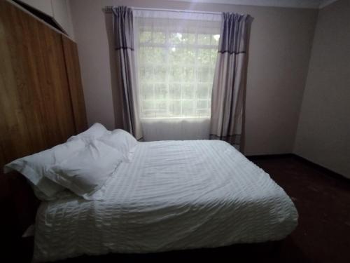 Φωτογραφία από το άλμπουμ του The Guest Wing Kalimbuka σε Zomba