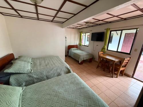 Postel nebo postele na pokoji v ubytování Brisa Del Mar