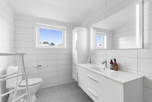 Koupelna v ubytování Spacious 4-BR Free Parking Tønsberg