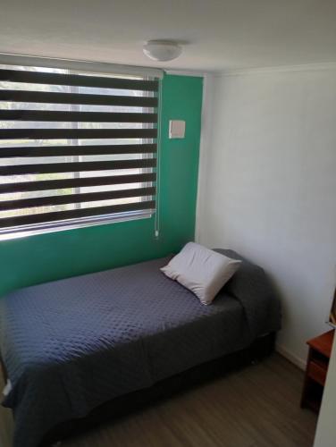 Ένα ή περισσότερα κρεβάτια σε δωμάτιο στο Departamento a pasos de la playa, Cap 6 personas