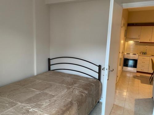 Ένα ή περισσότερα κρεβάτια σε δωμάτιο στο Feels like home 2