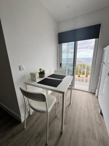 Η κουζίνα ή μικρή κουζίνα στο Apartamento junto al mar El Galeón