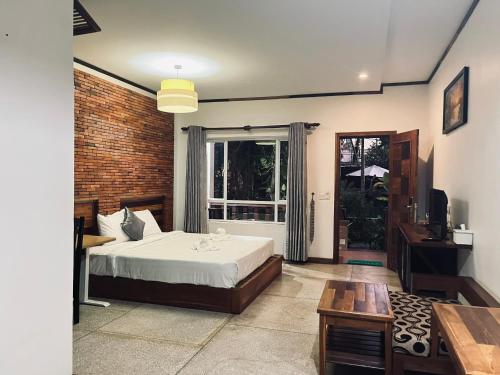 Postel nebo postele na pokoji v ubytování Lika's Family Pool Villa