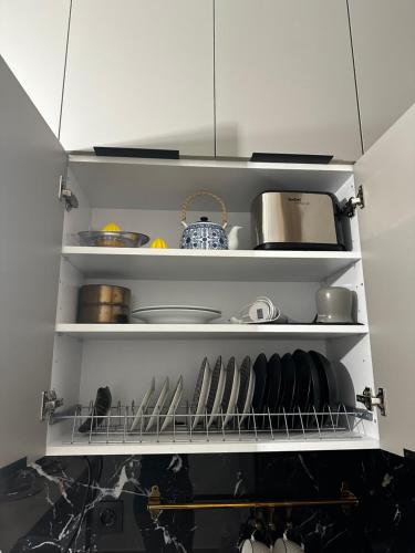 Η κουζίνα ή μικρή κουζίνα στο Panthera-Urban-Studio