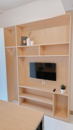 Μια τηλεόραση ή/και κέντρο ψυχαγωγίας στο 73 Utagawa 2BR Apartment By MkStay