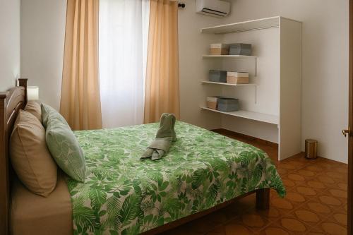 Ένα ή περισσότερα κρεβάτια σε δωμάτιο στο My Friends Place