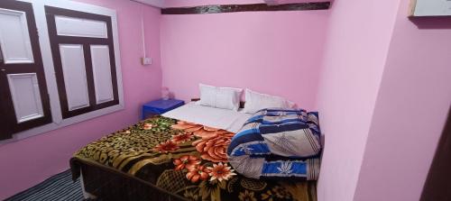 Giường trong phòng chung tại Hills Heaven Homestay