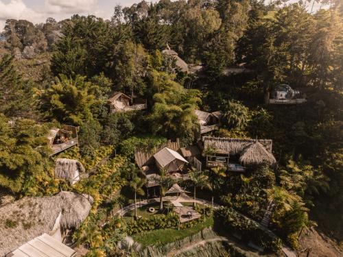 an overhead view of a village in the forest at Atma Villas Hotel Boutique Guatapé in Guatapé