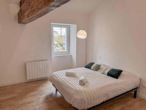 Postel nebo postele na pokoji v ubytování Entre Bressuire & Thouars- By R&G