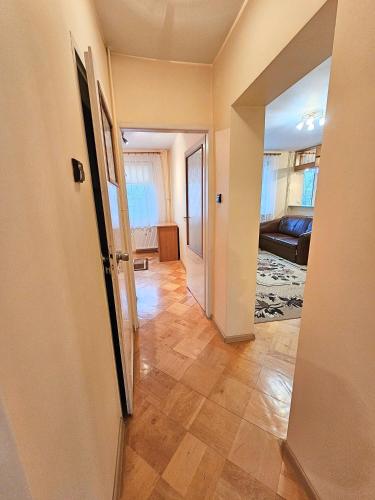 Ένα ή περισσότερα κρεβάτια σε δωμάτιο στο Mieszkanie przy Monte Casino