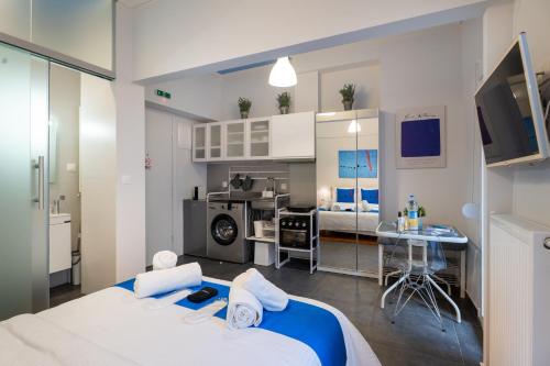 Rúm í herbergi á Hippodrome Cute - Blue