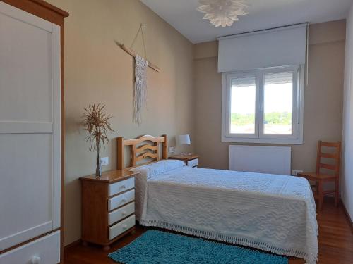 Ένα ή περισσότερα κρεβάτια σε δωμάτιο στο Torre Plaza 4