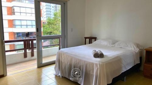 Ένα ή περισσότερα κρεβάτια σε δωμάτιο στο Apto de verão a 300mts do mar – Aceita pet