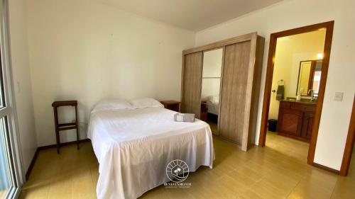 Giường trong phòng chung tại Apto de verão a 300mts do mar – Aceita pet