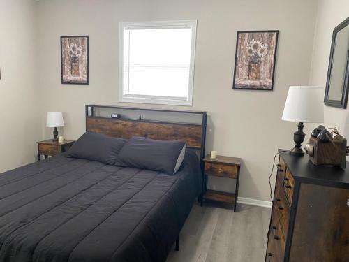 Giường trong phòng chung tại Beautiful Waterfront Ranch