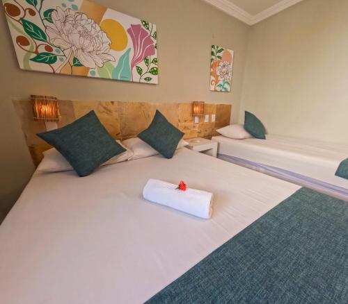 Ένα ή περισσότερα κρεβάτια σε δωμάτιο στο Pousada Hippopotamus Jeri