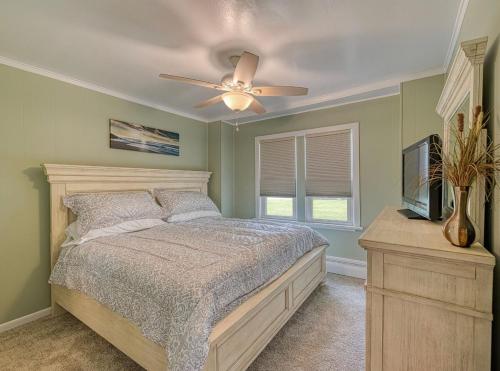 Ένα ή περισσότερα κρεβάτια σε δωμάτιο στο Beach Goers Paradise