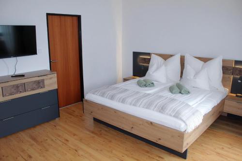 En eller flere senge i et værelse på Seefelder Hirsch