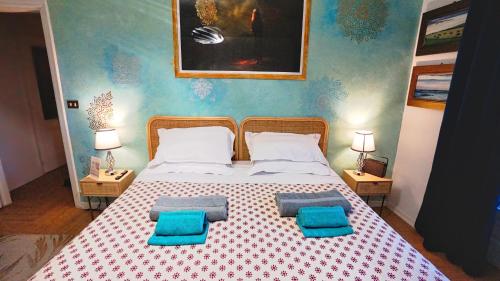 En eller flere senge i et værelse på Attico elegante con splendida vista sul Po e Superga