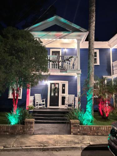 a house with lights on the front porch at night at Villa Mulvey # 3 in St. Augustine