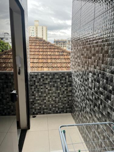 a balcony with a view of a building at Centro de união da vitória in União da Vitória
