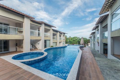 Bazén v ubytování Condomínio com Piscina a 900 m da praia, Imbassaí Top Flats - ITFs nebo v jeho okolí