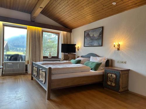 Ένα ή περισσότερα κρεβάτια σε δωμάτιο στο Altenburger Hof