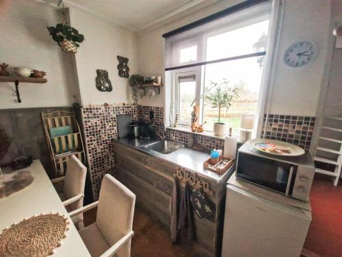 Η κουζίνα ή μικρή κουζίνα στο B&B Aan de Hoge Berg