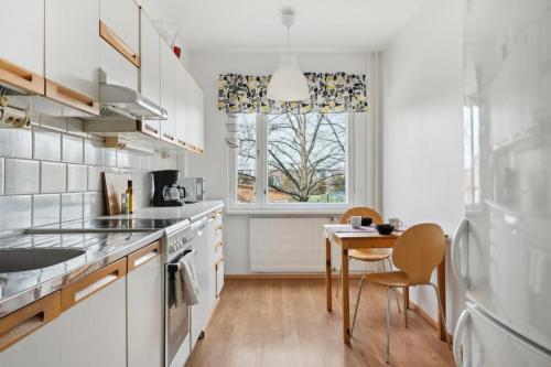 Køkken eller tekøkken på Bright and spacious apartment