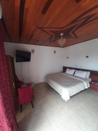 Katil atau katil-katil dalam bilik di Jacobs Hôtel