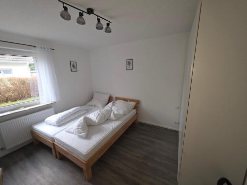 Ένα ή περισσότερα κρεβάτια σε δωμάτιο στο Nestwerk Solide L16-03