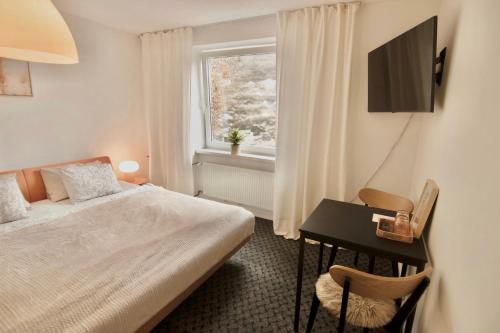 Ένα ή περισσότερα κρεβάτια σε δωμάτιο στο W28 Winterova