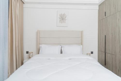 Postel nebo postele na pokoji v ubytování H&S Gateway Homes