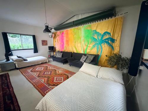 Ένα ή περισσότερα κρεβάτια σε δωμάτιο στο The Disco Studio