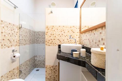 Ένα μπάνιο στο Quarto em Villa Blu Jeri