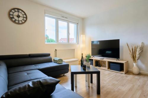 Μια τηλεόραση ή/και κέντρο ψυχαγωγίας στο Le Cosy Carvinois - Premium - Wifi - Close to Lille