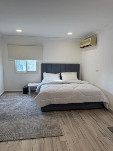 Ένα ή περισσότερα κρεβάτια σε δωμάτιο στο Farm house with all facilities in Al Dhaid , sharjah