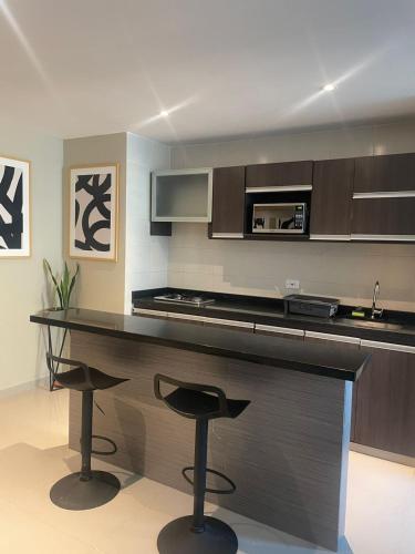 Η κουζίνα ή μικρή κουζίνα στο Apto Grand- Ithiel