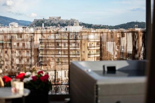 180 jacuzzi with Acropolis sunset view