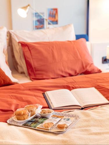 Ένα ή περισσότερα κρεβάτια σε δωμάτιο στο Panorama Cental Hotel Batumi