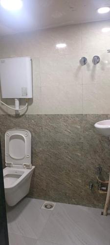 Ένα μπάνιο στο CHHATRAPATI SHIVAJI INTERNATIONAL DORMITORy