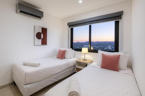 Ένα ή περισσότερα κρεβάτια σε δωμάτιο στο Silvertop - A magical apartment with great view