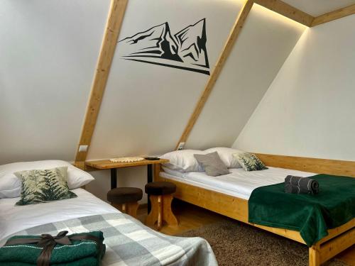 Ένα ή περισσότερα κρεβάτια σε δωμάτιο στο W Borze