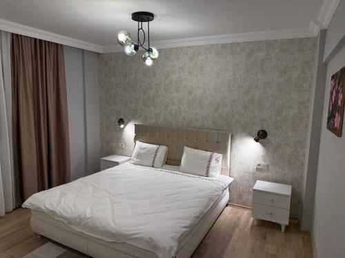 Voodi või voodid majutusasutuse Boutique comfort in the heart of the city toas